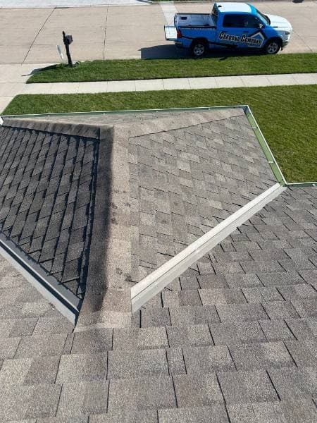 Steep-slope residential shingle roof installed by Cardona Company