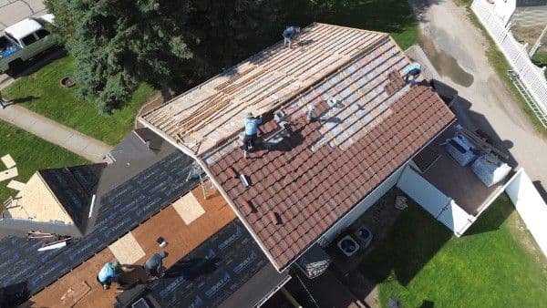 Roof replacement showing clean ridge lines and flashing
